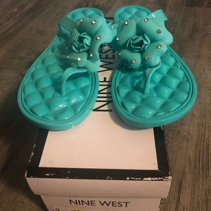 Brand new Nine West rubber flip flops.Sz. 9.